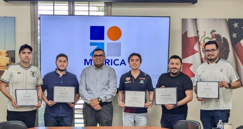 Grupo con diplomas Métrica
